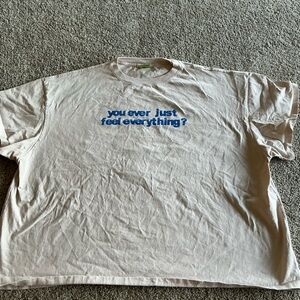 LONELY GHOST Beige Tee with Blue Text